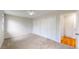 Bedroom with carpet, closets and neutral color palette leading to bathroom at 1006 Homestake Dr # 1D, Golden, CO 80401