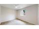 Bright bedroom features a modern ceiling fan and neutral carpeting at 1006 Homestake Dr # 1D, Golden, CO 80401