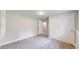 Carpeted basement bedroom with large closet and nearby bath at 1006 Homestake Dr # 1D, Golden, CO 80401