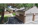 Charming townhome with attached garage and well-maintained landscaping on a sunny day at 1006 Homestake Dr # 1D, Golden, CO 80401