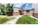 Charming home with brick accents, well-kept lawn, and inviting entrance at 1006 Homestake Dr # 1D, Golden, CO 80401