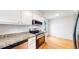 Kitchen with granite counters and stainless steel oven with microwave at 1006 Homestake Dr # 1D, Golden, CO 80401
