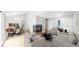 Open-concept living room featuring a fireplace, hardwood floors, and bright natural light at 1006 Homestake Dr # 1D, Golden, CO 80401