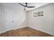 Bedroom featuring hardwood floors and a bright white door and trim at 1362 Wolff St, Denver, CO 80204