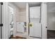 Bathroom and laundry closet featuring a stacked washer and dryer at 1362 Wolff St, Denver, CO 80204