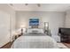 Comfortable bedroom with neutral colors, ceiling fan, and a scenic painting at 457 Black Feather Loop # 702, Castle Rock, CO 80104