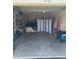 Attached garage providing ample storage space for a vehicle and other belongings at 457 Black Feather Loop # 702, Castle Rock, CO 80104