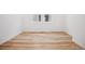 Bright bedroom with hardwood floors and two windows at 2102 Wagon Wheel Aly, Brighton, CO 80601