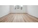 Bright bedroom with wood floors and large windows at 2102 Wagon Wheel Aly, Brighton, CO 80601