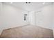 Neutral bedroom with a window and closet with sliding doors at 2102 Wagon Wheel Aly, Brighton, CO 80601