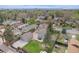 Aerial view showcasing the property's spacious backyard, detached garage, and prime location in a residential neighborhood at 2272 Jay St, Edgewater, CO 80214