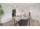 Finished basement featuring a desk workspace and doorway leading to the utility room with washer and dryer at 2272 Jay St, Edgewater, CO 80214
