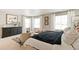 Spacious main bedroom featuring large windows, elegant furnishings, and natural light at 6506 13Th St, Frederick, CO 80530