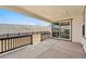 Relaxing covered back patio with sliding glass doors and a fenced-in backyard, perfect for outdoor living at 3370 Backdrop Ct, Castle Rock, CO 80108