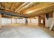 Unfinished basement with concrete floor and exposed ceiling joists awaiting customization for flexible living space at 3370 Backdrop Ct, Castle Rock, CO 80108