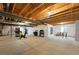 Unfinished basement space with exposed beams, insulated walls, and ample room for customization at 3370 Backdrop Ct, Castle Rock, CO 80108