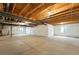 Unfinished basement with concrete floors and roughed-in utilities offers potential for customization and future expansion at 3370 Backdrop Ct, Castle Rock, CO 80108