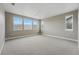 Spacious bedroom with neutral walls, carpet, and lots of windows for natural light at 3370 Backdrop Ct, Castle Rock, CO 80108