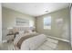 Serene bedroom with neutral colors, plush bedding, and a cozy ambiance at 3370 Backdrop Ct, Castle Rock, CO 80108
