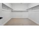 Walk in closet with carpet flooring and shelving at 3370 Backdrop Ct, Castle Rock, CO 80108