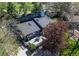 Aerial view of the home and backyard deck area with outdoor seating and grill at 8277 Carriage Ln, Parker, CO 80134