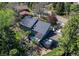 Aerial shot highlighting the home's backyard with hot tub and multiple deck spaces at 8277 Carriage Ln, Parker, CO 80134
