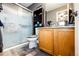 Bathroom with a glass-enclosed shower, granite countertops, and modern fixtures for a luxurious feel at 1372 S Cathay Ct # 104, Aurora, CO 80017