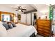 Bedroom with neutral wall color, carpeted floors, and access to a closet and bathroom at 1372 S Cathay Ct # 104, Aurora, CO 80017