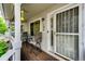 Cozy front porch featuring seating, an adorned security door, and a welcoming ambiance at 1372 S Cathay Ct # 104, Aurora, CO 80017