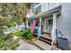 Charming front porch with a welcoming entrance and well-maintained landscaping at 1372 S Cathay Ct # 104, Aurora, CO 80017