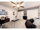 Bedroom featuring a ceiling fan, neutral walls, and ample closet space with an ensuite bath and generous floorplan at 1372 S Cathay Ct # 104, Aurora, CO 80017
