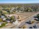 Aerial view of neighborhood with green trees, houses and landscape in autumn season at 6365 W Coal Mine Ave, Littleton, CO 80123