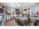 Eclectic bedroom featuring ample light with a neutral color palette, perfect for relaxation at 6365 W Coal Mine Ave, Littleton, CO 80123