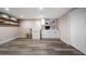 Well lit Kitchenette featuring modern appliances, white cabinets, and convenient layout at 6365 W Coal Mine Ave, Littleton, CO 80123