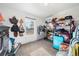 Spacious walk-in closet with built-in shelving and ample storage for clothing and accessories at 6365 W Coal Mine Ave, Littleton, CO 80123