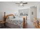 Bedroom featuring a large window and wooden furnishings at 15357 Flowergate Way, Parker, CO 80134