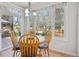 Cozy dining nook offers outdoor views with natural lighting at 15357 Flowergate Way, Parker, CO 80134