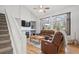 Spacious living room with vaulted ceilings and fireplace at 15357 Flowergate Way, Parker, CO 80134