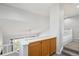 Upstairs hallway featuring a view of the backyard and other areas of the home at 15357 Flowergate Way, Parker, CO 80134