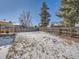 Large backyard with snow cover and wooden fence at 9235 Quitman St, Westminster, CO 80031