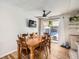 Dining area with wooden table and access to backyard at 9235 Quitman St, Westminster, CO 80031