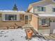 Front entrance of a brick house with a green door at 9235 Quitman St, Westminster, CO 80031