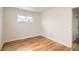 Bright bedroom with hardwood floors and neutral walls at 2660 Eppinger Blvd, Thornton, CO 80229