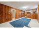 The finished basement includes wood paneling at 3052 S Joplin Ct, Aurora, CO 80013