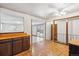 Inviting dining area with tiled floors, view to sliding glass door, neutral walls and ceiling fan with light at 3052 S Joplin Ct, Aurora, CO 80013