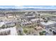 A scenic aerial view shows an expansive urban area with parks and distant mountain views at 1977 S Josephine St # 101, Denver, CO 80210