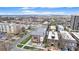 A vibrant neighborhood showcases dense housing and colorful rooftops against distant mountains at 1977 S Josephine St # 101, Denver, CO 80210