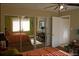 Bright bedroom boasts an adjacent sitting area, mirrored closets, and neutral decor at 1977 S Josephine St # 101, Denver, CO 80210