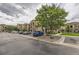 Attractive apartment complex featuring stone accents, well-maintained landscaping, and convenient parking at 9180 Rolling Way # 303, Parker, CO 80134