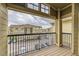 Balcony view overlooking the parking and apartment complex at 9180 Rolling Way # 303, Parker, CO 80134